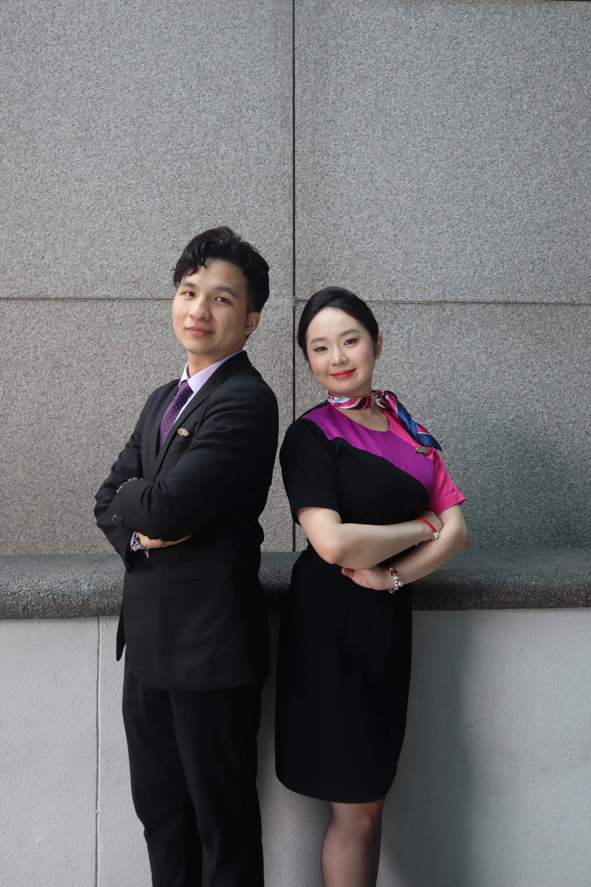 Two IETA students in cabin crew uniforms