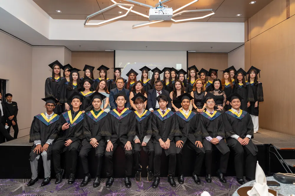 IETA graduates receiving certificates on stage