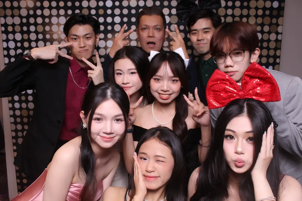 IETA students posing at a campus photobooth